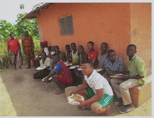 Orphans enjoying meal Christmas 2014