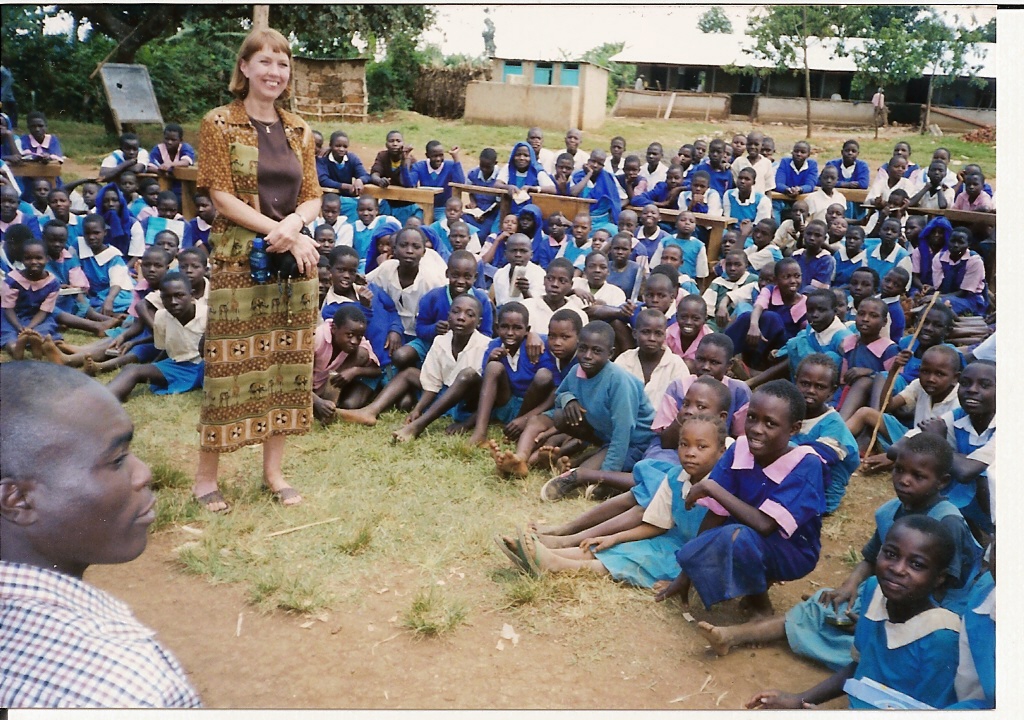 Shirley preaching  at a school