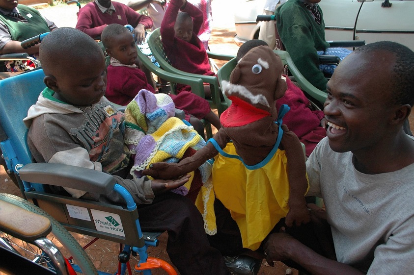 Ministering to disabled with puppets