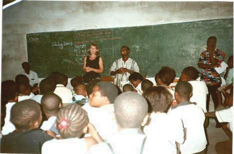 Shirley preaching in a school